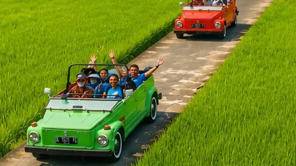 A family waving from a green open-top Volkswagen Safari on a narrow lane through bright green rice fields, with a red one ahead